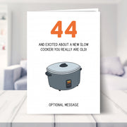 funny 44th birthday card shown in a living room