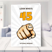funny 45th birthday card shown in a living room