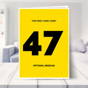 funny 47th birthday card shown in a living room