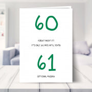 funny 60th birthday card shown in a living room
