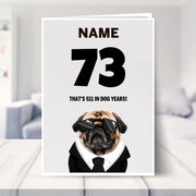 funny 73rd birthday card shown in a living room