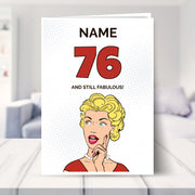 funny 76th birthday card shown in a living room