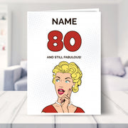 funny 80th birthday card shown in a living room