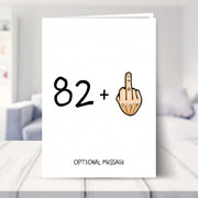 funny 83rd birthday card shown in a living room