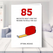 funny 85th birthday card shown in a living room