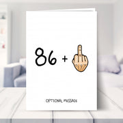 funny 87th birthday card shown in a living room