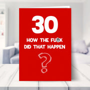 funny 30th birthday card shown in a living room