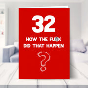 funny 32nd birthday card shown in a living room