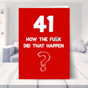 funny 41st birthday card shown in a living room