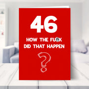 funny 46th birthday card shown in a living room
