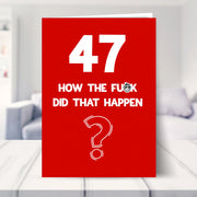 funny 47th birthday card shown in a living room