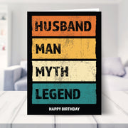 husband birthday cards shown in a living room