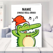 crocodile christmas card shown in a living room