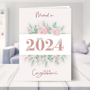 wedding day card 2024 shown in a living room