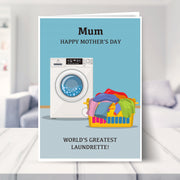 world's greatest laundrette card shown in a living room