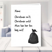 funny christmas card shown in a living room
