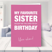 birthday card sister shown in a living room