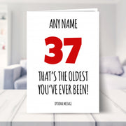 funny 37th birthday card shown in a living room