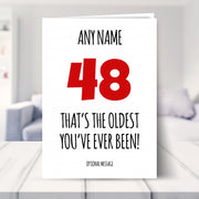funny 48th birthday card shown in a living room