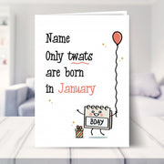 humorous birthday card shown in a living room