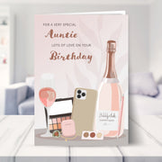 birthday card for Auntie shown in a living room