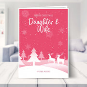 Daughter & Wife christmas card shown in a living room