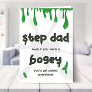 Step Dad birthday card shown in a living room