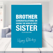 funny brother birthday card shown in a living room