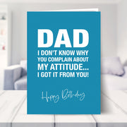 funny dad birthday card shown in a living room