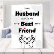 husband birthday card shown in a living room