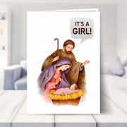 funny christmas card shown in a living room