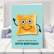 59th birthday card shown in a living room