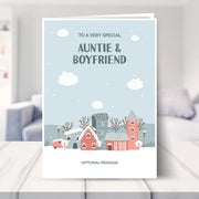 auntie and boyfriend christmas card shown in a living room