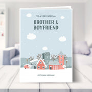 brother and boyfriend christmas card shown in a living room