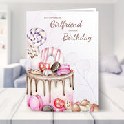 girlfriend birthday card shown in a living room