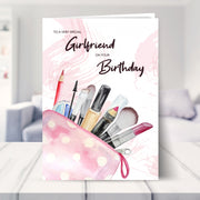 birthday card girlfriend shown in a living room