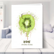 kiwi birthday card shown in a living room