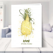 pineapple card shown in a living room