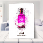 pink gin bottle birthday card shown in a living room