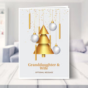 Granddaughter & Wife christmas card shown in a living room