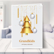 Grandkids christmas card shown in a living room
