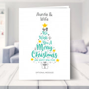 Auntie & Wife christmas card shown in a living room