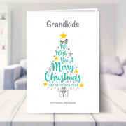 Grandkids christmas card shown in a living room