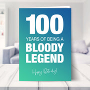100th birthday card shown in a living room