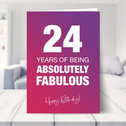 24th birthday card shown in a living room