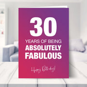30th birthday card shown in a living room