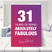 31st birthday card shown in a living room