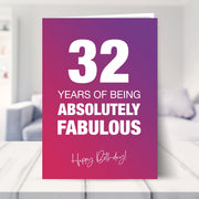 32nd birthday card shown in a living room