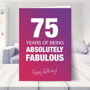 75th birthday card shown in a living room