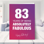 83rd birthday card shown in a living room